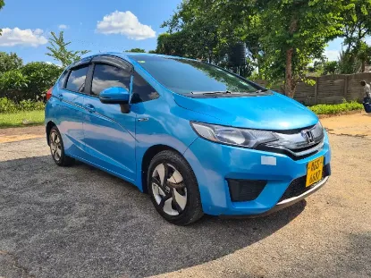 Picture of Hybrid Fuel Savers: Honda Fit Hybrid GP5, Toyota Axio, Toyota Aqua