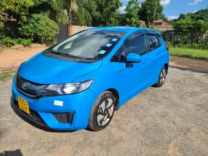 Picture of Hybrid Fuel Savers: Honda Fit Hybrid GP5, Toyota Axio, Toyota Aqua