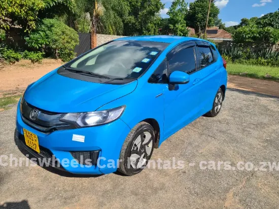 Picture of Hybrid Fuel Savers: Honda Fit Hybrid GP5, Toyota Axio, Toyota Aqua