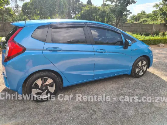 Picture of Hybrid Fuel Savers: Honda Fit Hybrid GP5, Toyota Axio, Toyota Aqua