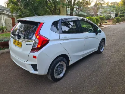 Picture of Hybrid Fuel Savers: Honda Fit Hybrid GP5, Toyota Axio, Toyota Aqua