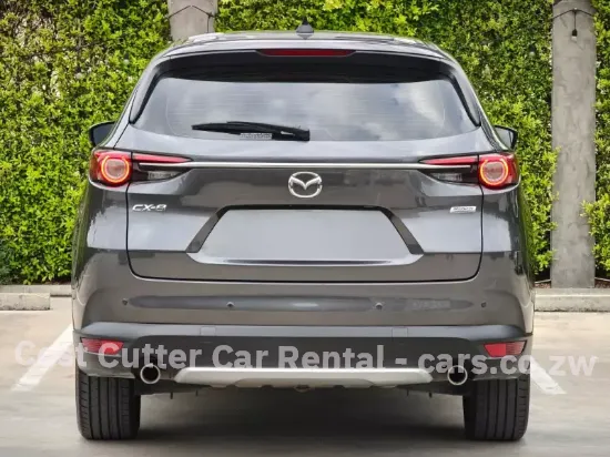 Picture of 3 seat row Mazda CX-8 for hire!