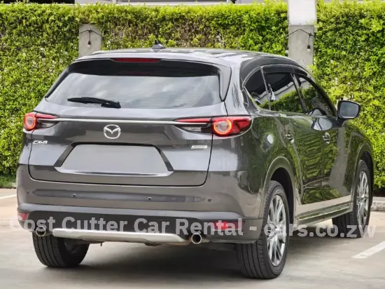 Picture of 3 seat row Mazda CX-8 for hire!
