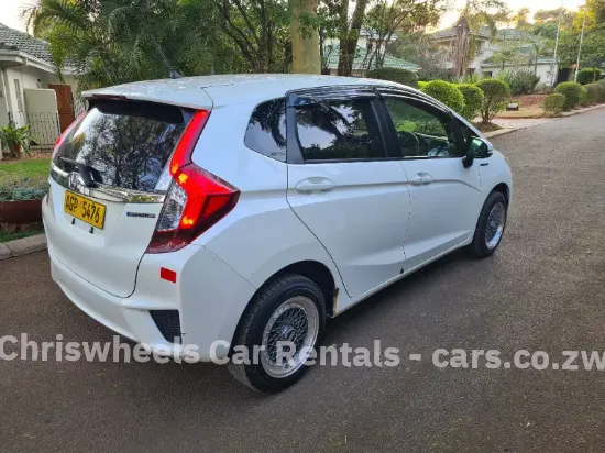 Picture of Hybrid Fuel Savers: Honda Fit Hybrid GP5, Toyota Axio, Toyota Aqua