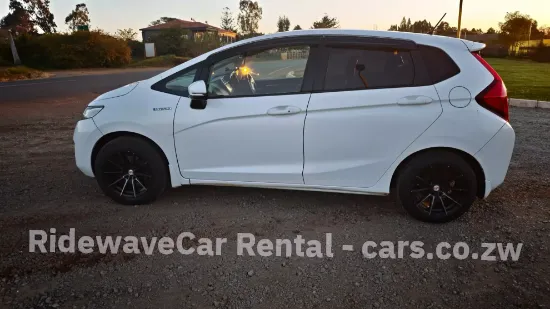 Picture of Honda Fit Hybrid / Fuel Savers For Hire ||| From