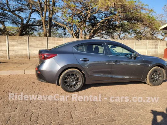 Picture of Mazda Axela Hybrid for hire / Mazda 3 ||| From