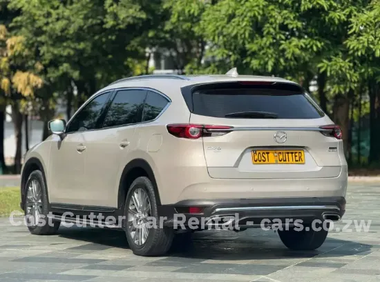 Picture of 3 seat row Mazda CX-8 for hire!